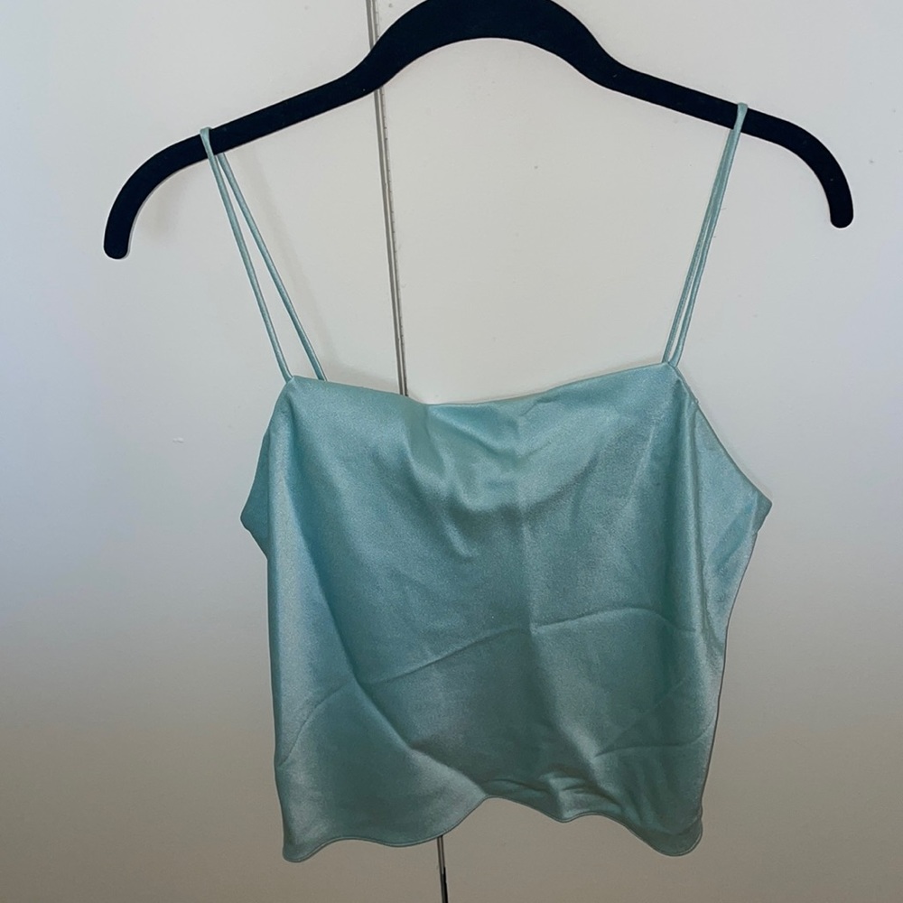 NWT Alice and Olivia powder blue top size S. Top right has slight stain